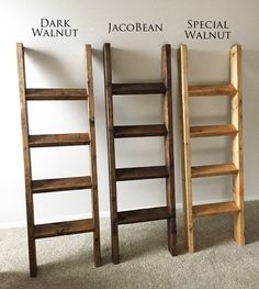 three wooden ladders sitting next to each other in front of a wall with the words dark walnut and special walnut