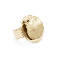 Introducing the beloved Terra design in a new form: the Terra Ring. Named for the Roman Goddess, the Terra Ring draws inspiration from the enduring bond between the moon and the earth. Crafted meticulously in shimmering 14k gold, with a watery finish, this ring makes a bold statement, both in weight and appearance, inviting wearers to embrace their inner strength and intuition. Symbolizing femininity and celestial harmony, it serves as a tangible reminder of our profound connection to the cosmos. DETAILS hand cast 14k gold. ¾ inch face. Hammered Open Ring In Recycled Gold, Hammered Recycled Gold Ring, 14k Gold Hand Forged Open Ring, Hand Forged 14k Gold Open Ring, Hand Forged Open Ring In Recycled Gold, Hand Forged Recycled Gold Open Ring, Timeless Shiny Finish Ring, Timeless Open Ring With Shiny Finish, Fine Jewelry Brass Rings For Anniversary