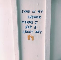 a sign that says sand in my shower means i had a great day on it