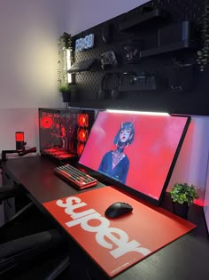 a desk with two computer monitors and a keyboard on it, along with a mouse pad