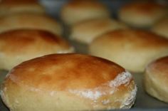 several rolls sitting on top of a metal tray