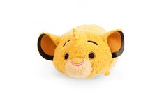 a small yellow stuffed animal with ears