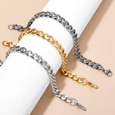 Add our Men's Stainless Steel Curb Chain Bracelet to your collection and you won't be disappointed!  Stand apart from the crowd with the elevated look of the thicker cuban style chain.  Measuring 7.5mm in width and 8" in length, this chain will quickly become your most worn accessory. Wear this bracelet solo or stacked with one of our many engravable men's ID bracelets or bead bracelets. Coordinates Jewelry, Dogeared Jewelry, Birthstone Charm Necklace, Cuban Style, Heart Wedding Rings, Mens Chain Bracelet, Curb Chain Bracelet, Bar Jewelry, Jewelry Lockets