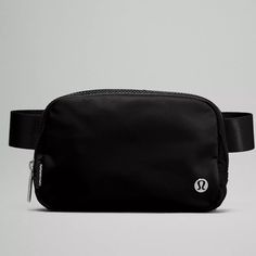 The Lululemon Everywhere Belt Bag Comes In Black, Is A Reserved And Classic Look. It Is Made Using Waterproof Polyester And Nylon Making It Light And Durable. Adjustable Strap Can Be Worn As Belt Bag Or Cross Shoulder. Lululemon Logo At The Bottom Left Corner Of The Front Side. Birthday Shopping List, Lululemon Bags, Lululemon Everywhere Belt Bag, Day Backpacks, Everywhere Belt Bag, Pink Wristlet, Festival Bag, Black Only, Mini Pouches