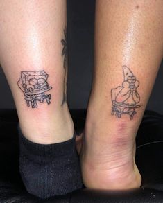 two people with matching tattoos on their legs