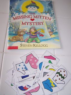 the missing mitten mystery book is next to it's matching cards and magnets