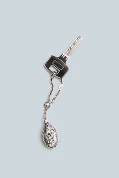 Discover elegant gifts and small gestures for the festive season. The Georg Jensen silver accessories collection expands with the Bud keychain, inspired by the original Art Nouveau motifs designed by Georg Jensen in the early 1900s. Explore more classic keychain gift ideas at georgjensen.com. Keychain Gift Ideas, Small Gestures, Elegant Gifts, Accessories Collection