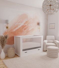 a baby's room with a crib, chair and large painting on the wall