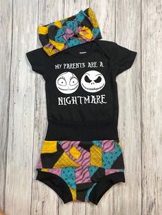 This adorable baby outfit set features chic high waisted bummies with a matching bodysuit (short or long sleeved) and top knot headband or baby bow headband - so you have lots of styling options! ♥ ABOUT THIS SET ⚬ Sizes 0-3 months to 18-24 months. ⚬ Made of a soft and stretchy Ribbed knit fabric and super soft knit fabric that feels great to the touch, wears well and looks fabulous. ⚬ Bummies have a wide and high waist band with banded leg holes, are very comfy and fit any baby extremely well w Gothic Baby, Goth Baby, Top Knot Headband, Baby Bow Headband, Body Suit With Shorts, Baby Bow, A Nightmare, Unisex Baby Clothes, Gender Neutral Baby Clothes