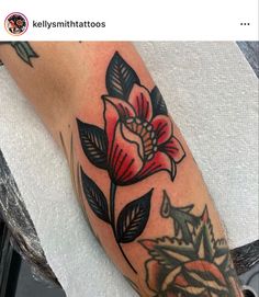 a person with a flower tattoo on their arm