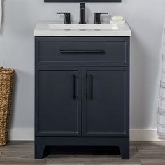 a bathroom vanity with a sink and mirror