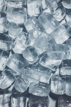 ice cubes are stacked on top of each other