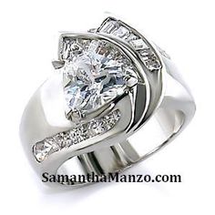 a white gold ring with diamonds on it