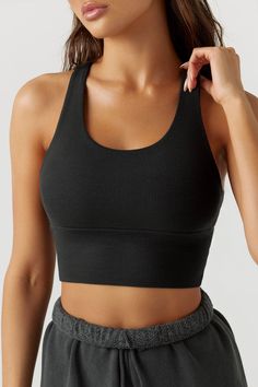 Scoop neck, longline tank bra with a racerback silhouette. Double lined. Our FlexRib fabric was designed with function and comfort in mind. It's soft, stretchy and made to move with you. You'll want to wear it all day, every day. Color: Black FlexRib Sizing: X/S (0-2), S/M (4-6), M/L (8-10) Model is 5'8" and wearing size X/S Fabric: 90% Rayon, 10% Spandex Care: Machine Wash Cold With Like Colors.Care: Lay Flat to Dry. Made in Los Angeles Form Fitting Tops, Neutrogena Makeup, Long A Line, Wear It, Makeup Remover, Vintage Black, Scoop Neck, Every Day, Angeles