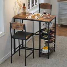 a small table with two chairs and a wine rack on it in front of a window