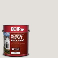 a purple paint with the words behr premium plus painted on it's side