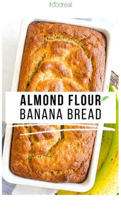 a banana bread sitting in a pan on top of a table next to some bananas