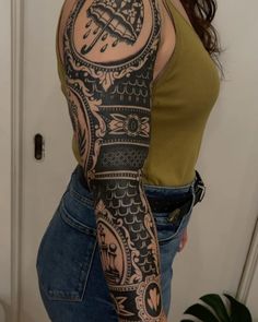 a woman with a tattoo on her arm