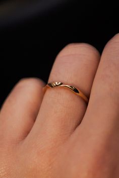 The Möbius Band features a continuous wave design that embodies unity and infinity. The ring is handcrafted out of a D-shaped (half round) metal, featuring a single ribbon-like wave. This listing is for ONE single ring in 14K Gold Fill The thickness of the metal used with this ring measures approximately 2mm which gives this piece a durable and sturdy design while maintaining that effortless look. While this ring is gorgeous on its own, we think it makes a lovely stack when combined with the Ex Spiral Ring With A Modern Twist For Formal Occasions, Minimalist Twisted Jewelry For Anniversary, Modern Twist Formal Jewelry With Twisted Shape, Modern Twisted Jewelry For Formal Occasions, Modern Twist Twisted Jewelry For Formal Occasions, Spiral 14k Gold Wedding Ring, Twisted 14k Gold Rings With Modern Twist, 14k Gold Spiral Wedding Ring, Modern Twist 14k Gold Twisted Ring