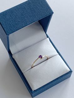 This 14k Solid Gold Birthstone Ring features a bezel mounting set with a genuine, faceted semi-precious or precious stone; the ring has a beautiful smooth and bright finish. Item Details: 14k Sold Gold Band 3mm Stone 0.95mm band width Available in every birthstone month January - Garnet February - Amethyst March - Aquamarine April - White Topaz May - Emerald June - Pearl July - Ruby August - Peridot September - Sapphire October - Tourmaline November - Citrine December - Blue Topaz PLEASE NOTE: O Formal Birthstone Ring With Round Band, Minimalist Gemstone Birthstone Ring For Formal Occasions, Yellow Gold Faceted Birthstone Ring For Anniversary, Faceted Yellow Gold Birthstone Ring For Anniversary, Classic 14k Gold Birthstone Ring With Bezel Setting, Elegant Faceted Sapphire Promise Ring, Classic 14k Gold Amethyst Birthstone Ring, Classic Yellow Gold Amethyst Birthstone Ring, 14k Gold Faceted Birthstone Ring For Anniversary