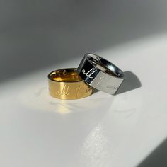 Looking for a ring that's both stylish and uplifting? Our "All I Ever Need Is Within Me" Inscription Ring is a perfect choice, featuring a heartfelt and inspiring message that's sure to uplift your spirit and draw compliments from all who see it. Crafted from high-quality 316 stainless steel and dipped in 18k real gold for added luxury and shine, this ring features a high polish finish that adds a touch of sophistication and glamour to the piece. The beautiful scrolling font words add a touch of Meaningful Open Ring For Promise, Meaningful Promise Open Ring, Minimalist Personalized Promise Heart Ring, Valentine's Day Promise Ring In Stainless Steel, Minimalist Anniversary Rings With Custom Text, Minimalist Custom Text Anniversary Rings, Pearl Shop, Inspirational Message, Real Gold