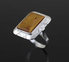 This Beautiful, Elegant And Traditional Tiger Eye Woman Ring made from high quality Sterling Silver 925 Its the perfect gift for anyone of any age and excellent for everyday wear. Item Specifications: Model # PASN3-TG Metal Type: Sterling Silver Metal Stamp: 925 Shape Square Style: Western Ring Size: 27mm x 22mm ( approx 1 x 7/8 inch) Stones: Tiger Eye Stone 20mm x 15mm (approx 6/8 x 5/8 inch) IMPORTANTWe work with natural stones and each stone can be slightly different from the picture. Each st Sterling Silver Brown Rings With Polished Finish, Sterling Silver Rings With Brown Polished Finish, Brown Sterling Silver Rings With Polished Finish, Brown Sterling Silver Signet Ring With Polished Finish, Western Ring, Western Rings, Tiger Eye Ring, Woman Ring, Ring Square