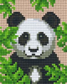 a panda bear with green leaves in the background