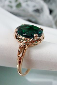 "Natural Treated Green Emerald Ring Edward Design#70z (smaller version) Rose Gold plated Sterling Silver Custom Made Inspired by Edwardian jewelry of the early 1900s, I now offer this lovely Antique reproduction ring in sterling silver rose gold plated. This gorgeous ring is set with a stunning approximately 3.6ct genuine Green Emerald gemstone (Color/Heat treated for clarity and saturation). (VS to Si1 clarity) The oval cut Emerald is 12mm (9/16th of an inch) Long by 10mm Wide (3/8th\"). The ri Vintage Emerald Rings Gold, Antique Emerald Ring Gold, Victorian Emerald Ring, Emerald Ring Oval, Instagram Abbreviations, Vintage Emerald Rings, Antique Emerald Engagement Ring, Mafia Men, Emerald Ring Design