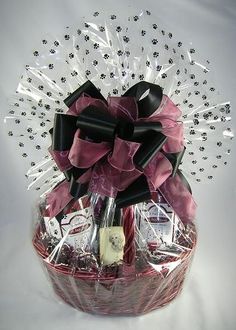 a basket filled with lots of chocolates and candy