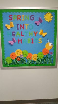 a bulletin board that says spring into healthy habitats