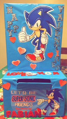 a cardboard box with an image of sonic the hedgehog on it and hearts around it