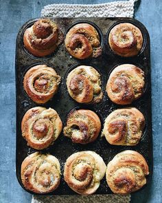 freshly baked cinnamon rolls on a baking sheet