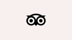 an owl's eyes are shown in this black and white logo for the company