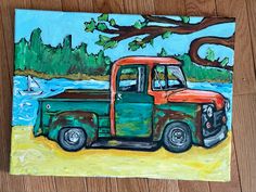 a painting of an old green truck on a wood floor next to a body of water