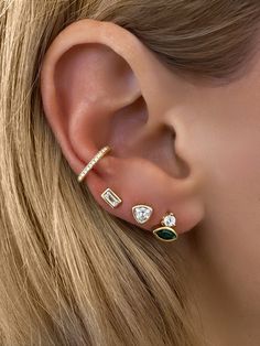 Featuring a stunning combination of sparkling CZ diamonds and vibrant emerald stones. Add a pop of color to any outfit with these elegant studs.Stone: Cubic Zirconia & EmeraldSize: 8mm tall, 7mm wide.Materials: Sterling Silver & 14K Gold Vermeil Silver Diamond Earrings, Gold Bond, Vermeil Jewelry, Demi Fine Jewelry, Emerald Earrings, Jewelry Stand, Diamond Drops, Stunning Earrings, Cz Diamond