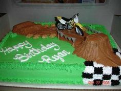 a birthday cake with a dirt bike on it