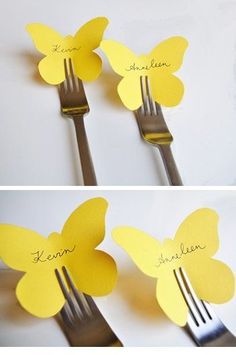 the butterfly place cards are made out of yellow paper