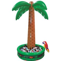 an inflatable pool with a large palm tree and toys inside it, on a white background