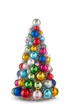 a small christmas tree with multicolored ornaments on it's top and bottom