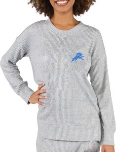 Fit Feminine fit, long sleeve crew sweatshirt Durable, ribbed crew neck Tagless collar Style and Team Spirit Screen-printed team graphics Additional Details Officially licensed product Athletic Heather Long Sleeve Top For Fans, Athletic Heather Crew Neck Top For Game Day, Collegiate Long Sleeve Loungewear Top, Collegiate Long Sleeve Tops For Loungewear, Athletic Heather Top With Ribbed Cuffs For Fall, Collegiate Long Sleeve Sweater For Game Day, Collegiate Sweater For Game Day, Athletic Heather Crew Neck Sweatshirt For Fan Gear, Team Spirit Long Sleeve Sweater For College