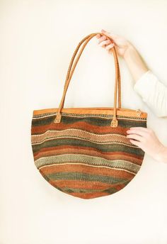 Traditional Cheap Handwoven Bag, Cheap Traditional Handwoven Bag, Made In Mada Bags, Brown Bohemian Straw Tote Bag, Brown Bohemian Jute Straw Bag, Bohemian Brown Jute Straw Bag, Brown Bohemian Straw Bag For Everyday Use, Brown Handwoven Hobo Tote Bag, Travel Handwoven Brown Hobo Bag