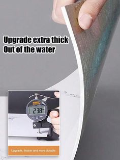 a person is using a digital thermometer