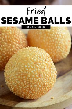 sesame balls on a wooden plate with text overlay that reads, fried sesame balls