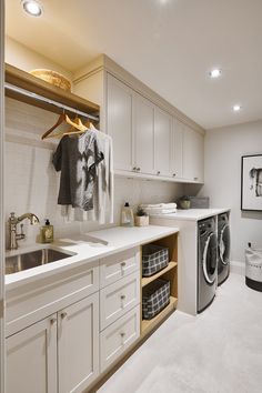 a washer and dryer in a small room