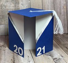 a blue and white box with the number twenty on it