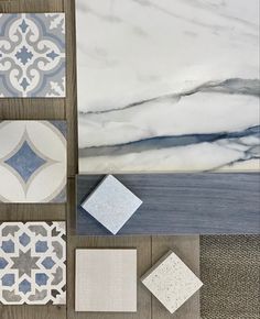 several different types of tile laid out on the floor with various shapes and colors to choose from