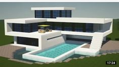 a modern house with a pool in the middle