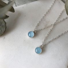 Please allow 10-15 days for production and delivery if item is not in stock. Our petite aquamarine necklace is a minimalist dream. Warm hand-textured metal melds perfectly with aqua, creating a timeless piece you can effortlessly stack with anything in your jewelry box. ✧ 14k gold-fill or sterling silver ✧ 16" chain with free 2" extender ✧ Aquamarine is the stone of courage and is the birthstone for March  ✧ Aqua may appear warmer in tone when set in gold vs silver ✧ Pendant measures 6mm Aquamarine Necklace Vintage, Gold Vs Silver, Gold Necklace Simple, Aquamarine Necklace, Aquamarine Crystal, Aquamarine Stone, Magpie, March Birth Stone, Stone Necklace