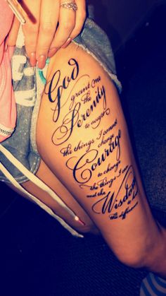 a woman's leg with some writing on it