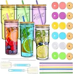 there are many different types of drinks in mason jars with straws and spoons